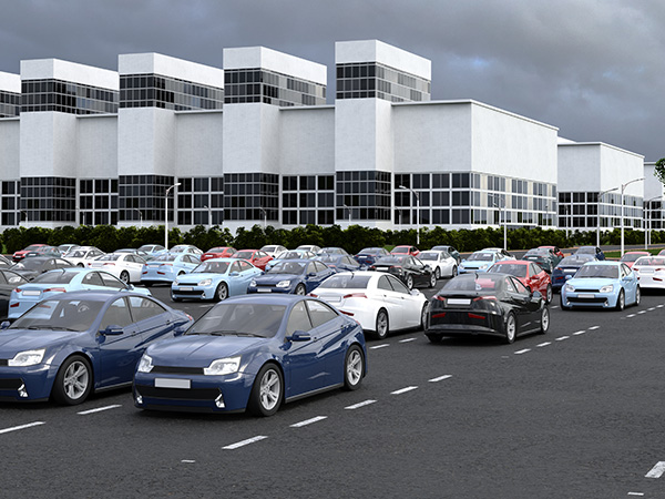 a fleet of cars parked in a parking lot
